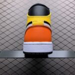 Air-Jordan-1-MID-Noir-Jaune-1.jpg
