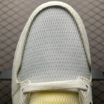 Air-Jordan-1-MID-SE-Voltage-Yellow-1.jpg