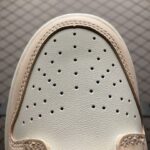 Dunk-Low-Orange-Pearl-Womens-1.jpg